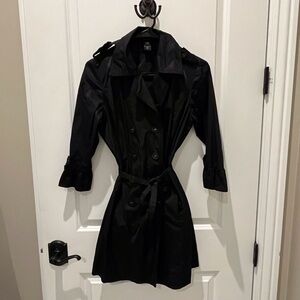 Unique double breasted Black coat. 3/4” flayed sleeves.